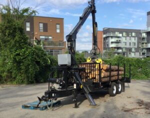 Log loader for automated harvesting