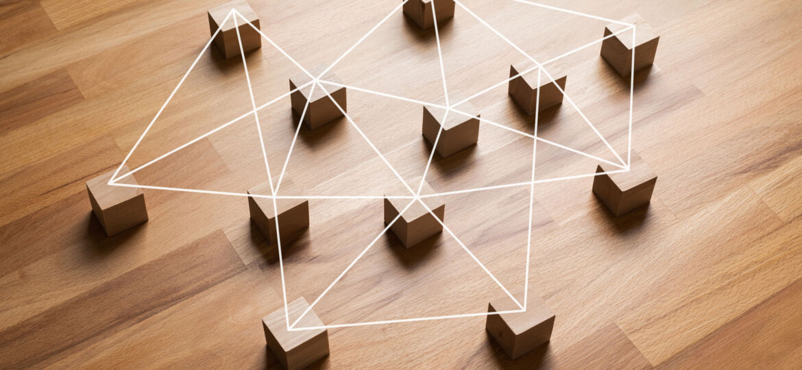 Connection or networking concepts with wood block.teamwork management