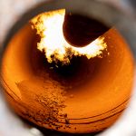Lime kiln oxygen enrichment to achieve capacity increase and energy reduction Closeup shot of a rotary kiln for clinker production in cement plant